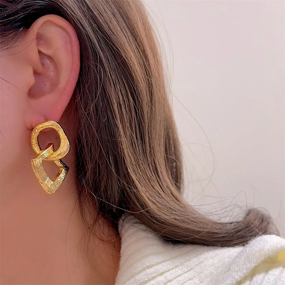 Retro geometric circle pendant earrings with 3.4cm drop in gold or silver electroplated finish