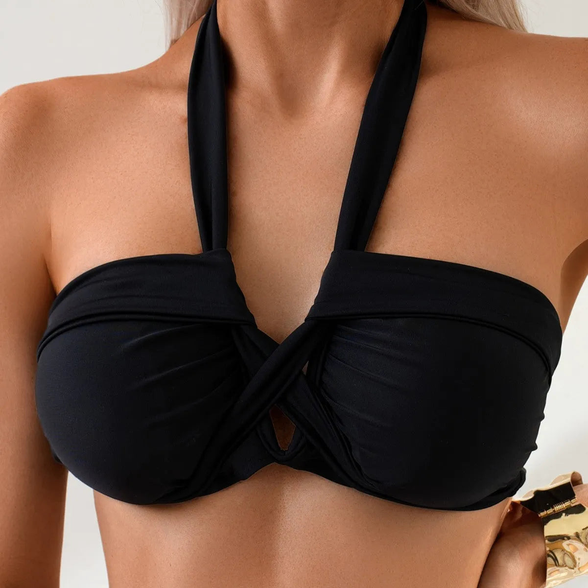 Black solid colour backless women's bikini swimsuit for swimming sports.