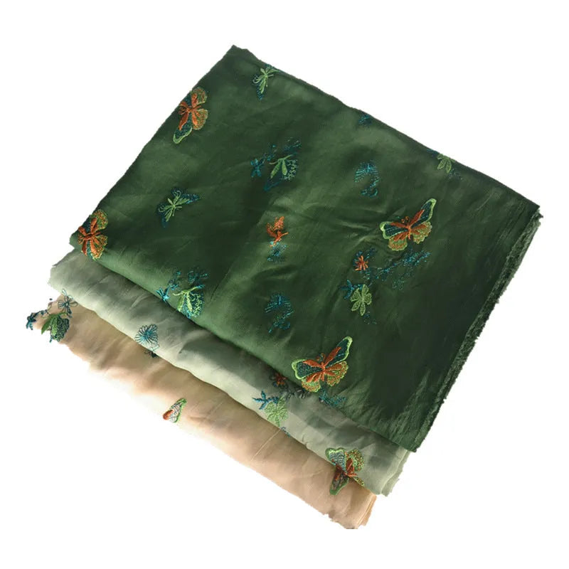 Pure ramie Hanfu embroidery fabric in beige, green, and dark green colours showing 140cm width