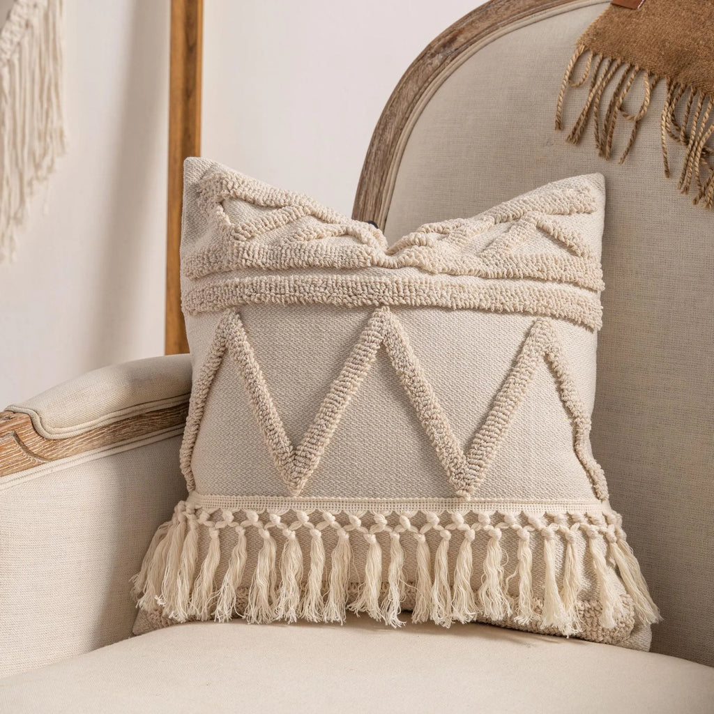 Knitted cushion cover with tassel trim in stripe pattern, available in six colours including spiral dots and woven rabbit fur