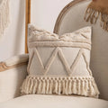 Knitted cushion cover with tassel trim in stripe pattern, available in six colours including spiral dots and woven rabbit fur