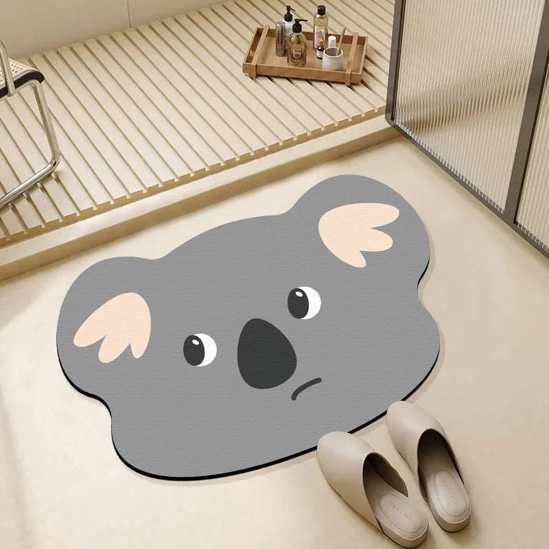 Diatomaceous earth bathroom mat with animal cartoon design in shower setting