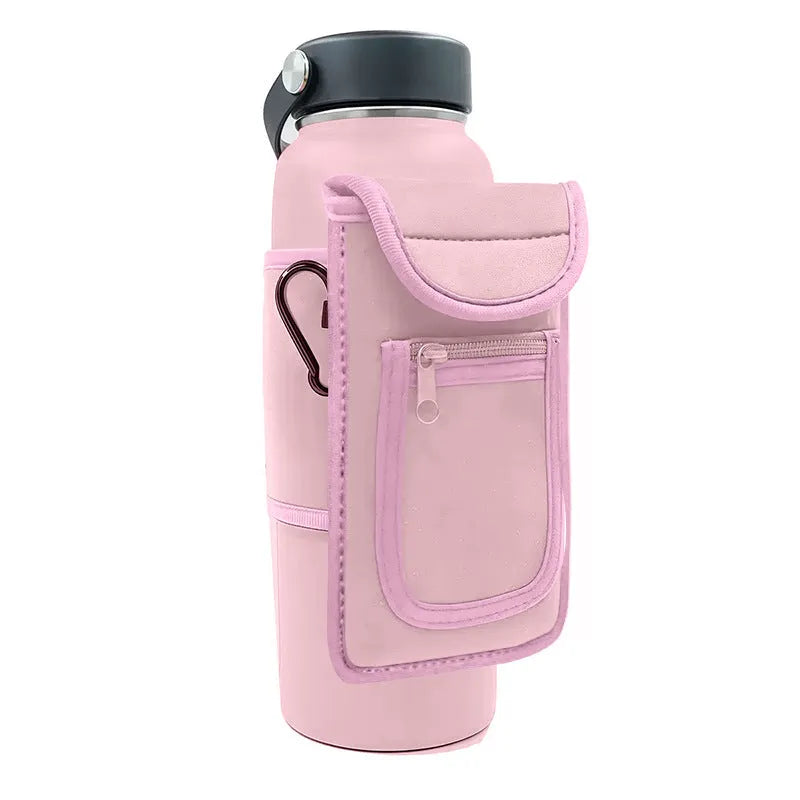 Fitness magnetic cup sleeve covering a large sports bottle with a carabiner clip attached.