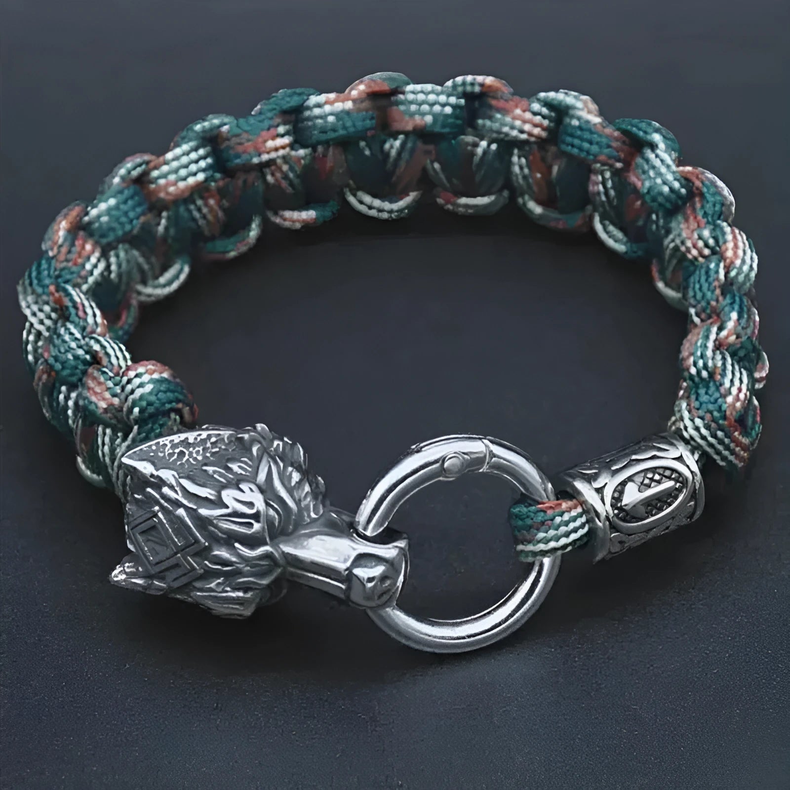 Handmade stainless steel Luen wolf head bracelet in camouflage colour showing size options.