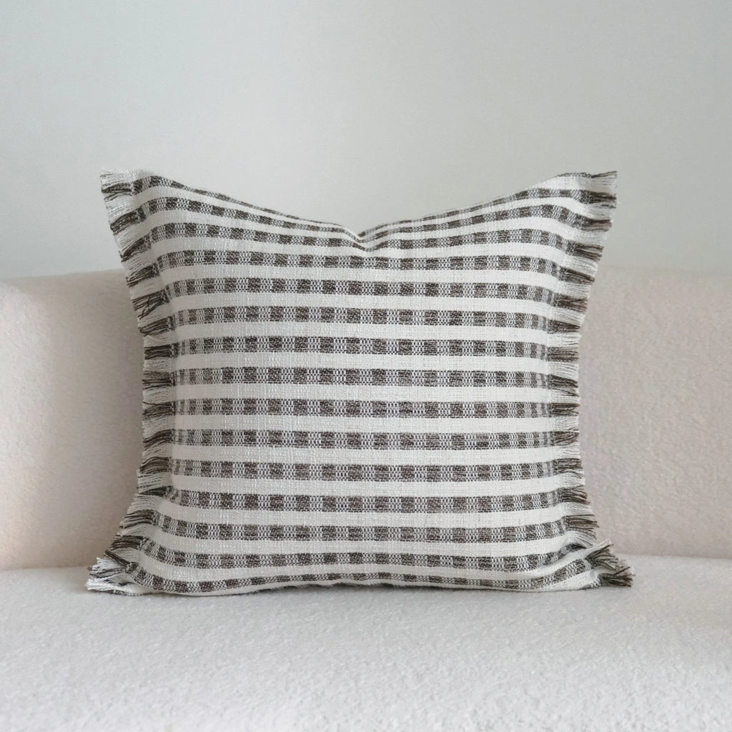 Coffee brown Chinese classical style cushion cover with stripe pattern on a living room sofa