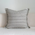Coffee brown Chinese classical style cushion cover with stripe pattern on a living room sofa