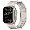 Silver stainless steel magnetic buckle replacement strap for Apple Watch on a wrist