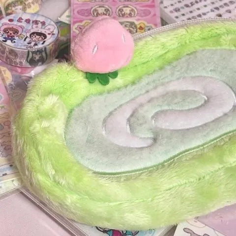 Cream and pink Swiss roll cake design velvet pencil case roll organiser.