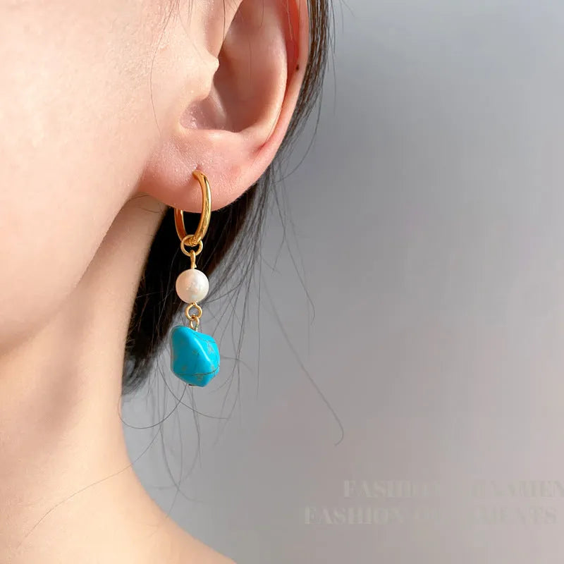 Geometric cultured pearl and turquoise ear clip earrings showing both short and dangle styles