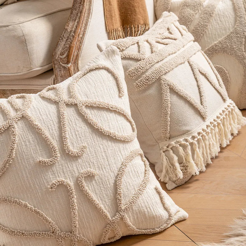 Knitted cushion cover with tassel trim in stripe pattern, available in six colours including spiral dots and woven rabbit fur