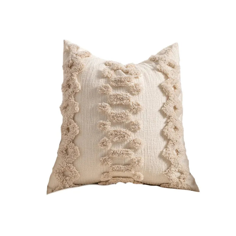 Knitted cushion cover with tassel trim in stripe pattern, available in six colours including spiral dots and woven rabbit fur