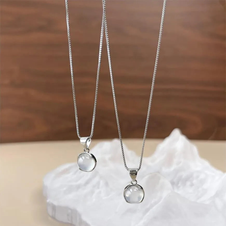 Women's oval pendant necklace with geometric eight awn star design on adjustable 21-50cm chain in X7 6moon light colour