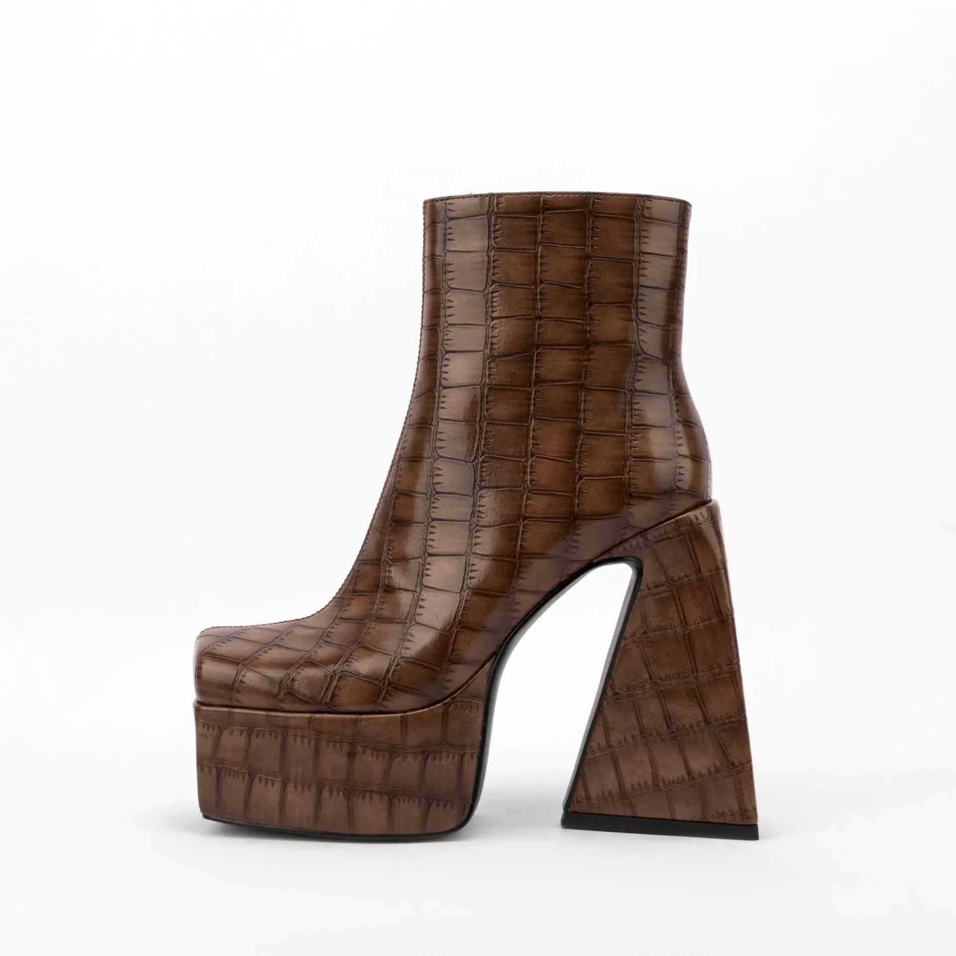Women's ankle boot with a super high heel in a solid beige colour, made from artificial PU material.