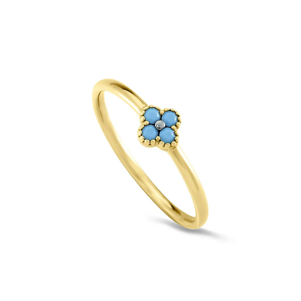 Simple silver turquoise ring for women with gold turquoise diamond finish on white background