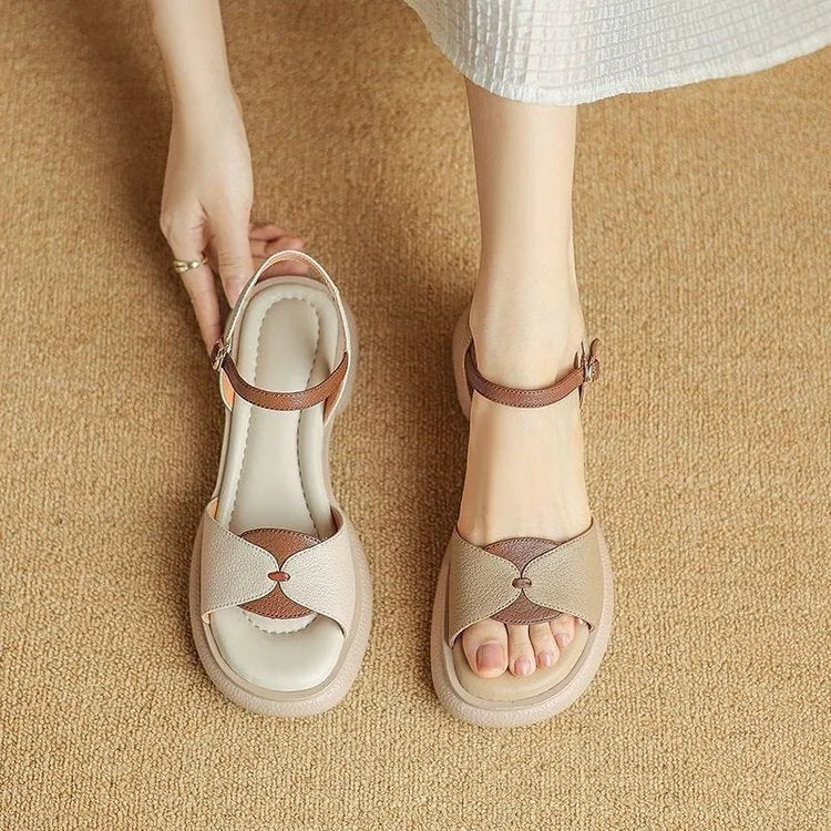 Women's khaki open toe sandals with a chunky platform heel made from renewable leather.