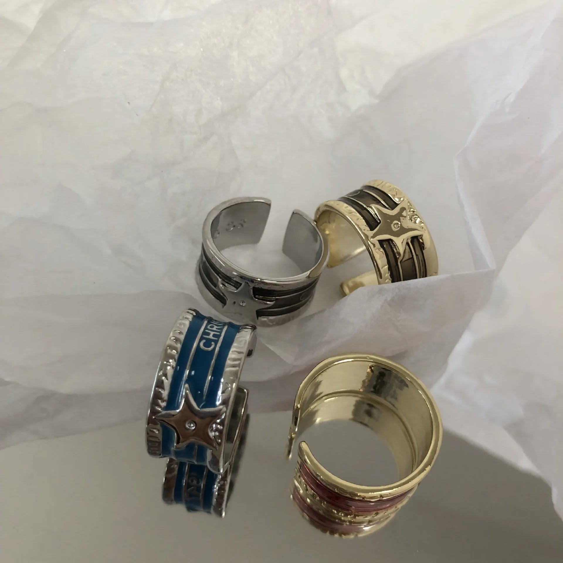 Adjustable geometric copper ring with distressed electroplated finish in multiple colour options