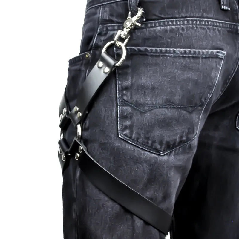 Black PU leather fashion leggings laid flat, showing sleek synthetic leather material.