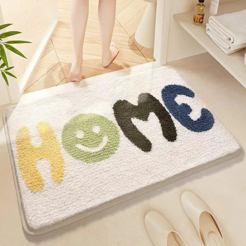 Rainbow pattern square carpet mat with plastic bottom in sky sea colour, shown in 40x60cm and 50x80cm sizes.
