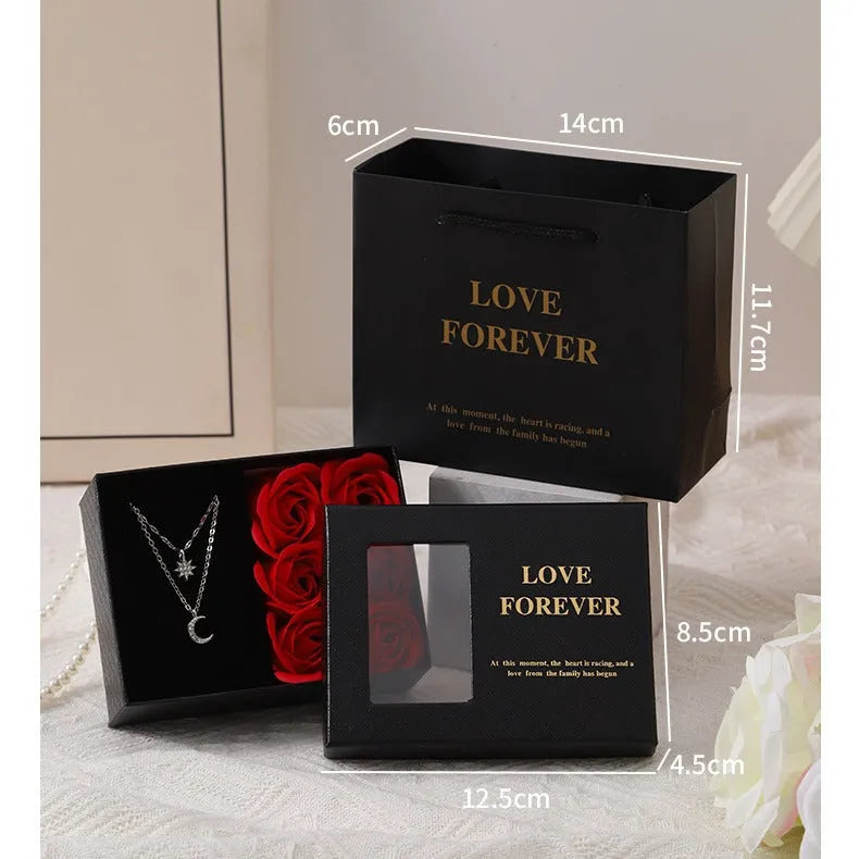 Korean style red soap flower gift set in box with handbag, six sculpted flowers inside.