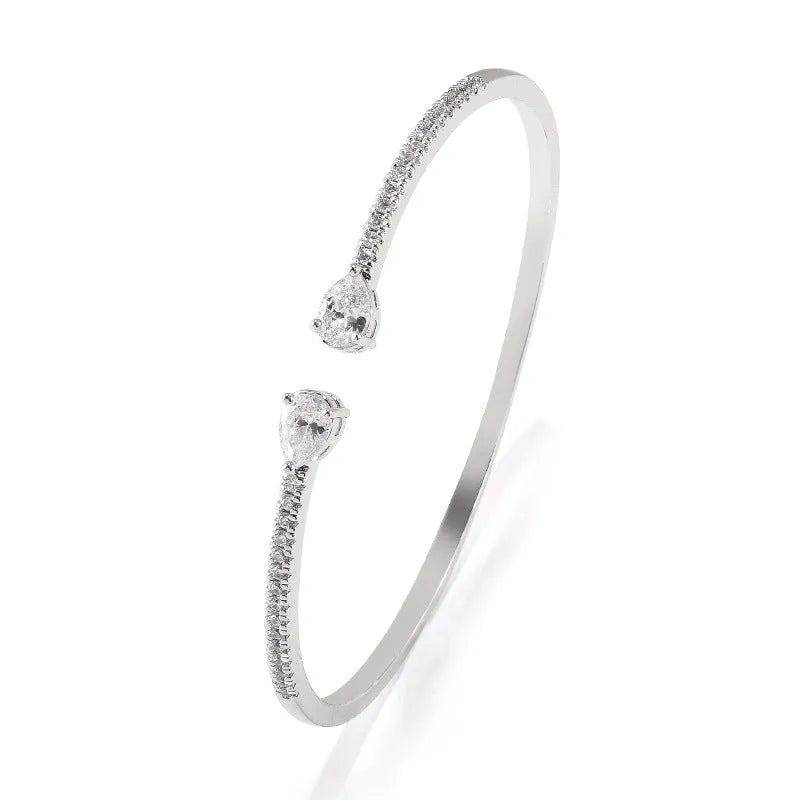 Copper bracelet with inlaid white zircon stones in simple jewellery design