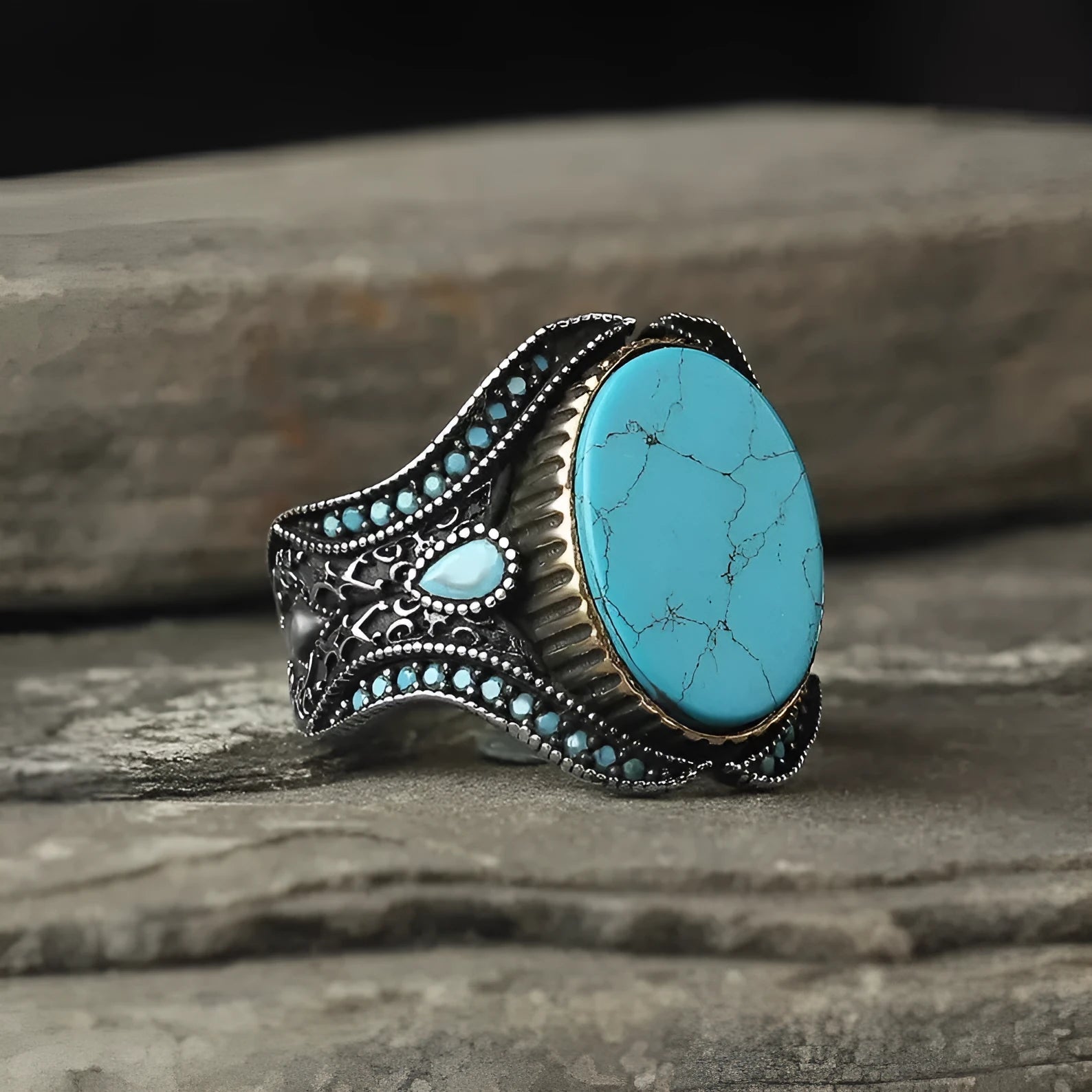Men's antique silver alloy ring with a round band and a central turquoise gemstone.