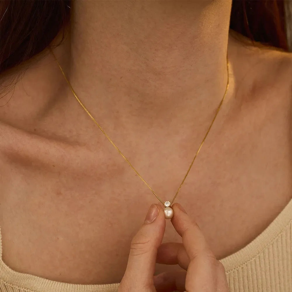 Women's stainless steel necklace with imitation pearl and zircon pendant in gold or steel colour