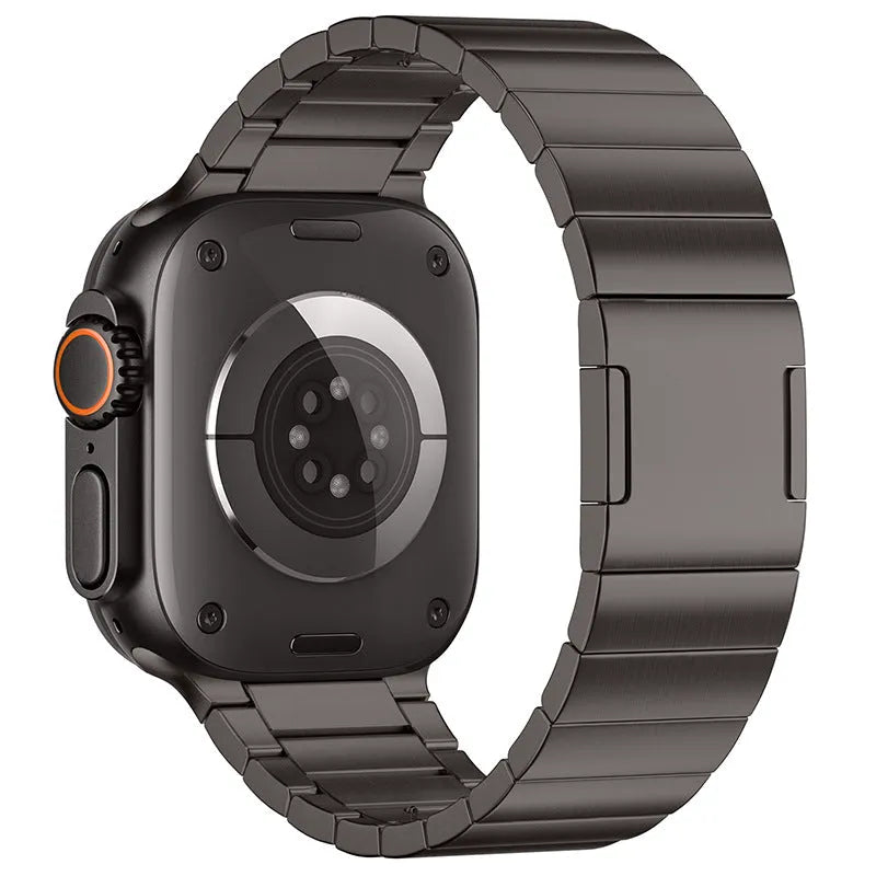 Silver stainless steel magnetic buckle replacement strap for Apple Watch on a wrist