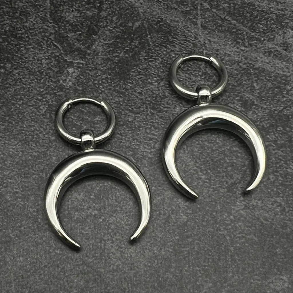 Silver geometric hoop earrings with moon detail and clip fastening
