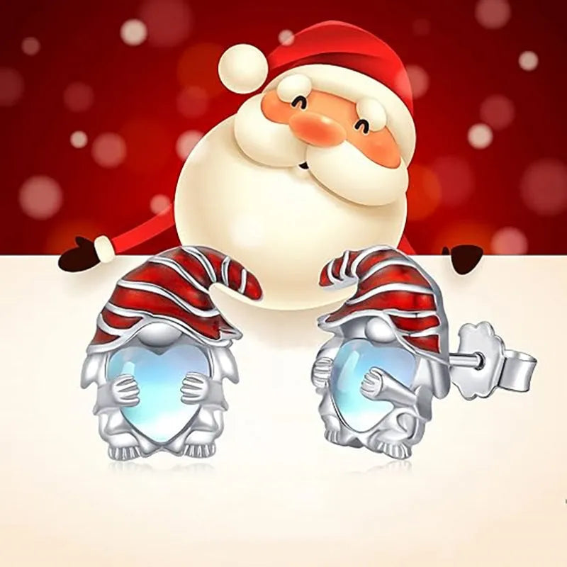 A pair of women's Santa Claus fashion earrings with a heart shape in an electroplated white gold colour.