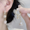 Silver-coloured copper tassel earrings with confession balloon and rhinestone ball double pendant design
