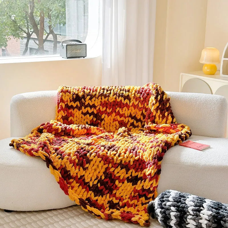 Thick striped chenille blanket in a choice of four colours, showing textured ice bar section dyeing on a 130x170cm cover.