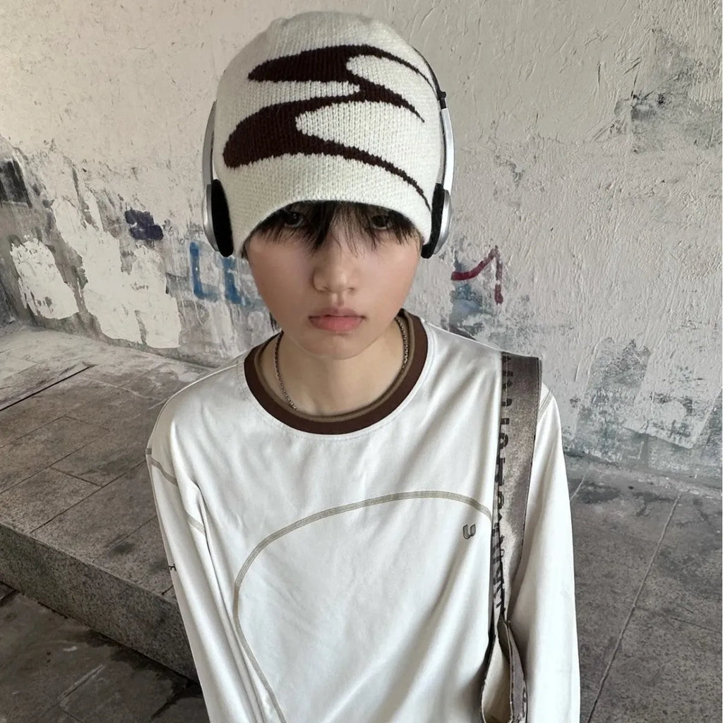 Knitted acrylic beanie hat in black, grey, or white for autumn and winter wear