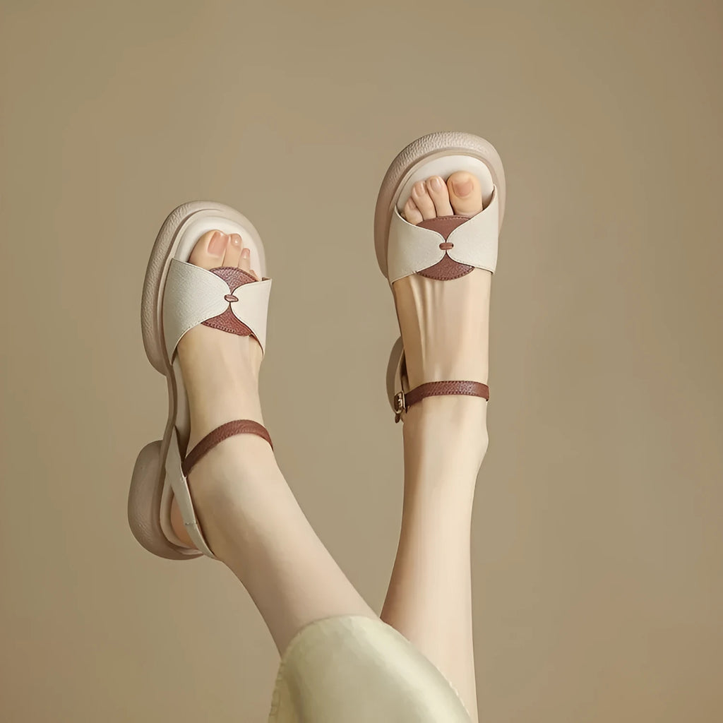 Women's khaki open toe sandals with a chunky platform heel made from renewable leather.