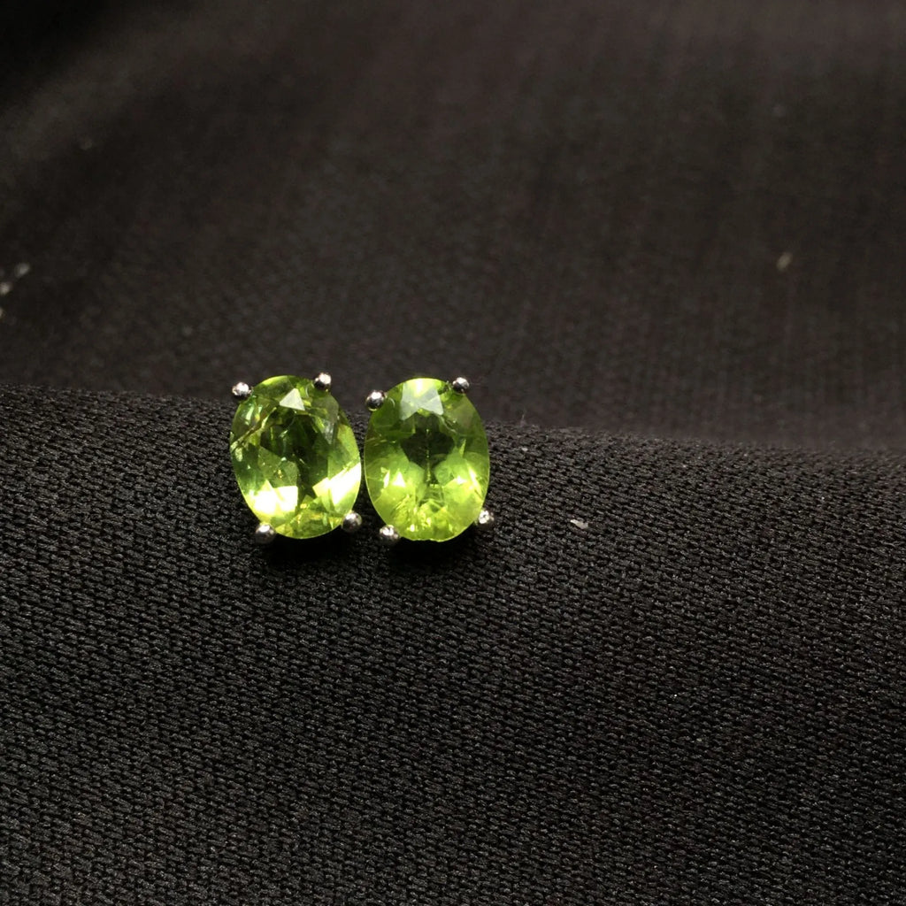 Natural grass green olivine stud earrings in S925 silver with 6×8mm elliptical stone