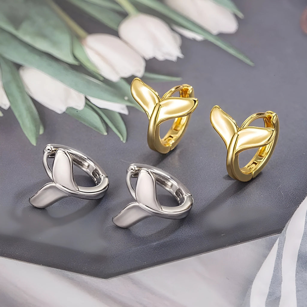 Women's fashion fishtail earrings in gold colour with simple design