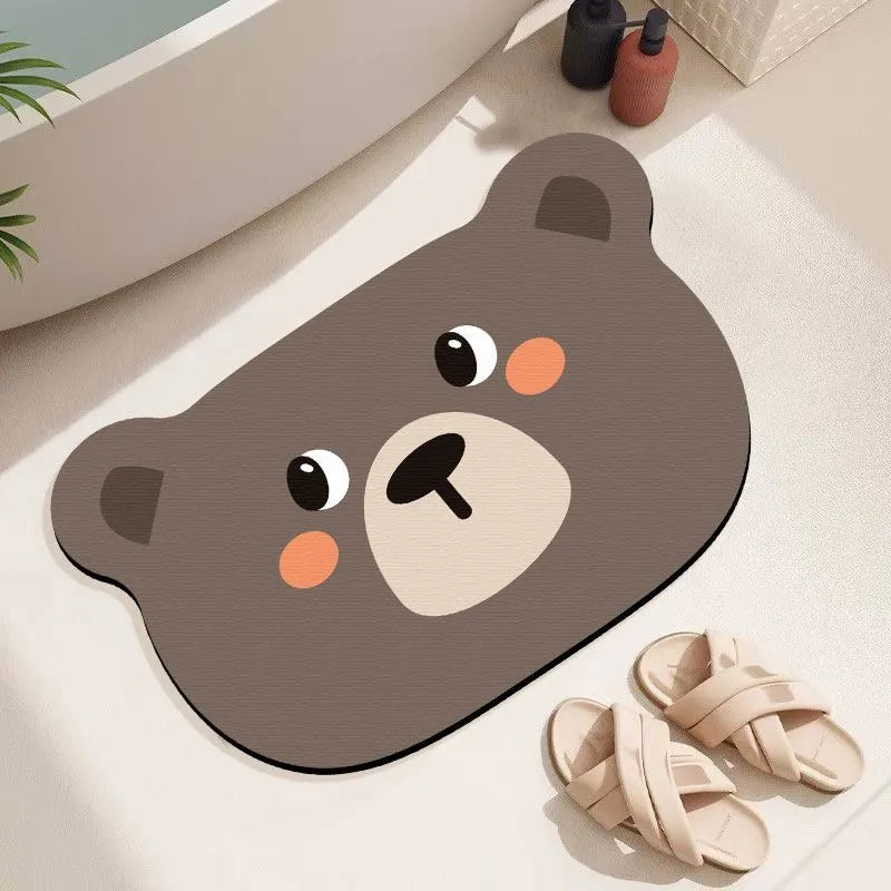 Diatomaceous earth bathroom mat with animal cartoon design in shower setting