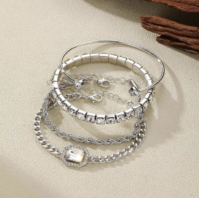 Retro style four-piece alloy bracelet set with geometric square diamond design in gold or silver finish