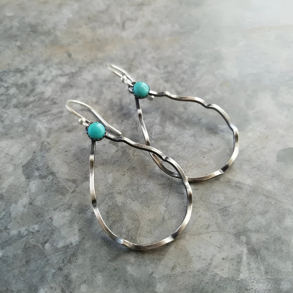 Turquoise circle bohemian earrings with antique silver finish and geometric design