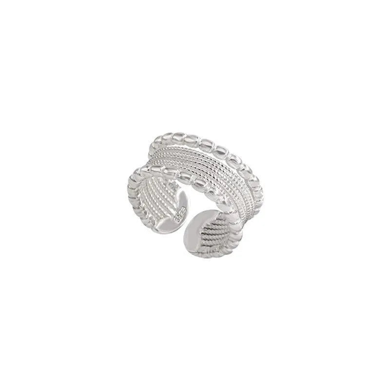 Copper geometric ring with adjustable opening and woven twisted multilayer design