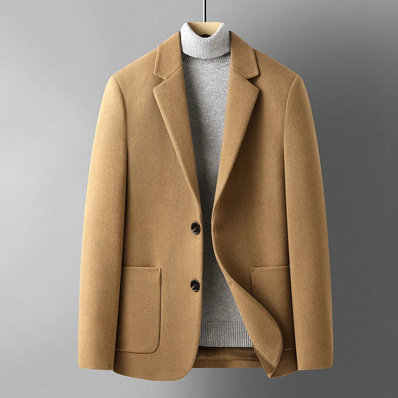 Men's slim fit wool blazer in a classic colour on a hanger, showing notch lapel and button front.