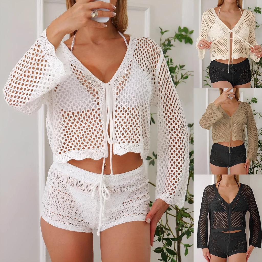 Light khaki women's cardigan blouse with bell sleeves and a cropped hem on a hanger.