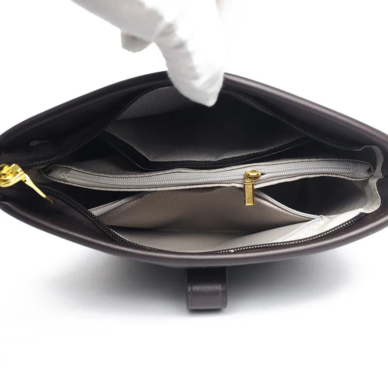 Korean style black bucket messenger bag with double shoulder straps and internal organisation pockets
