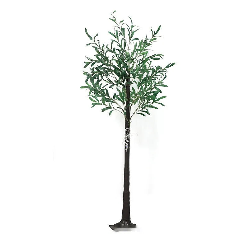 1.8 metre tall artificial olive leaf tree with warm white LED lights illuminated in a garden setting.