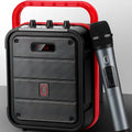 MS62AI portable Bluetooth speaker with wireless microphone, remote control, and charging cable.