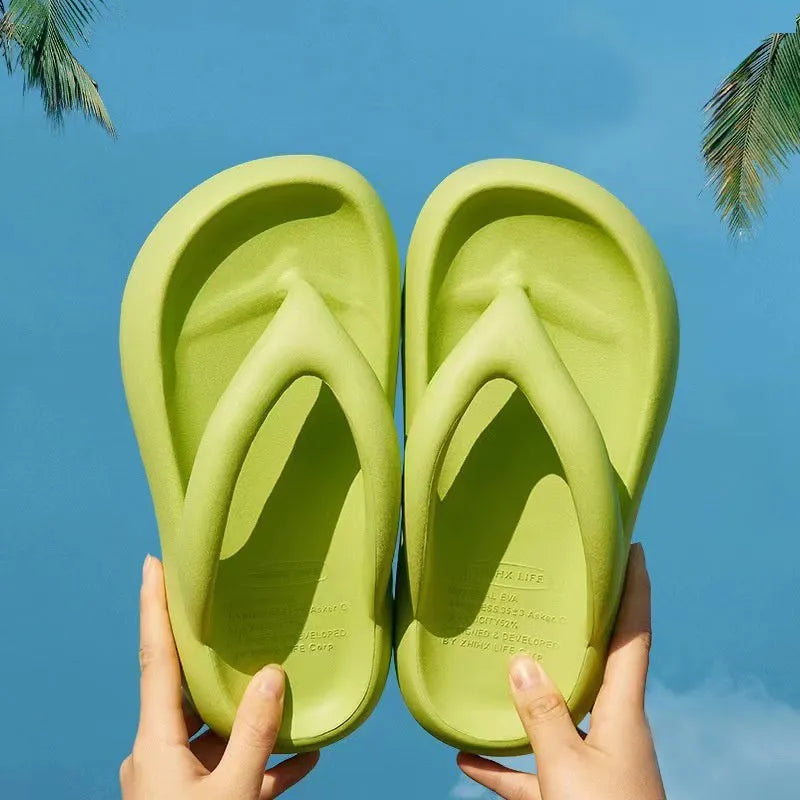 Solid colour women's flip-flops with a thick EVA sole and a small bow on the upper.