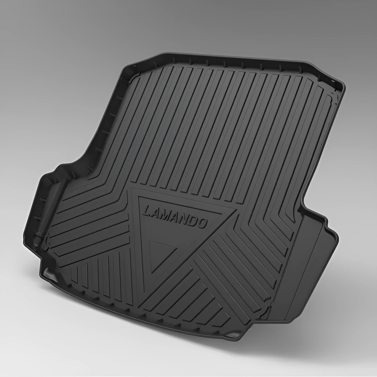 Black car boot liner with carbon fibre pattern, designed for a model-specific TPE tail pad fit.