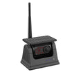 Solar-powered wireless reversing camera with magnetic mount, shown in black.