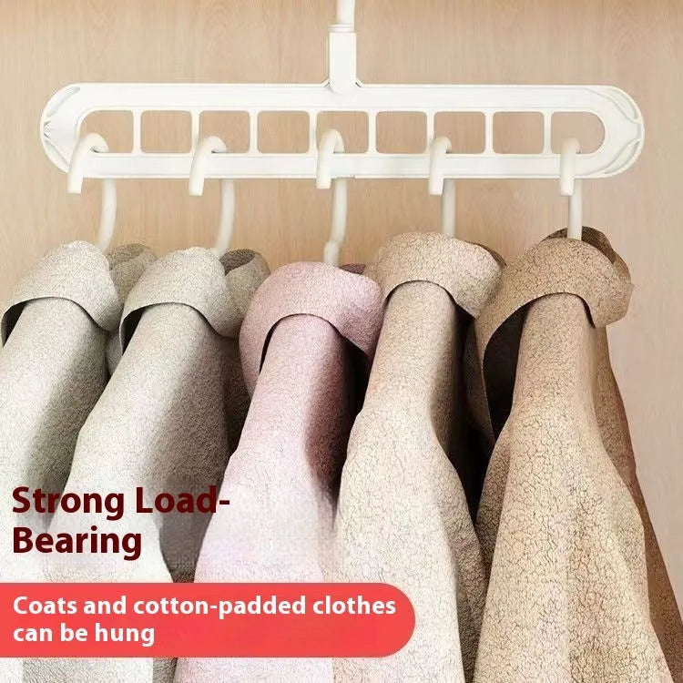 Green plastic hanger with nine holes for hanging multiple trousers or skirts vertically