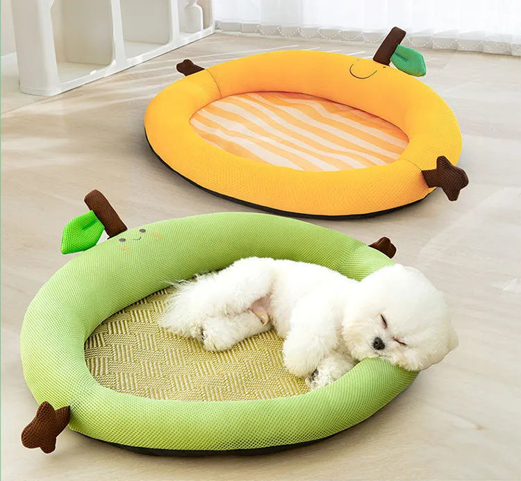 Green fruit-shaped pet nest with a raised backrest edge for dogs and cats on a wooden floor.