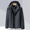 Man's black three-in-one removable waterproof mountaineering suit for hiking and skiing.